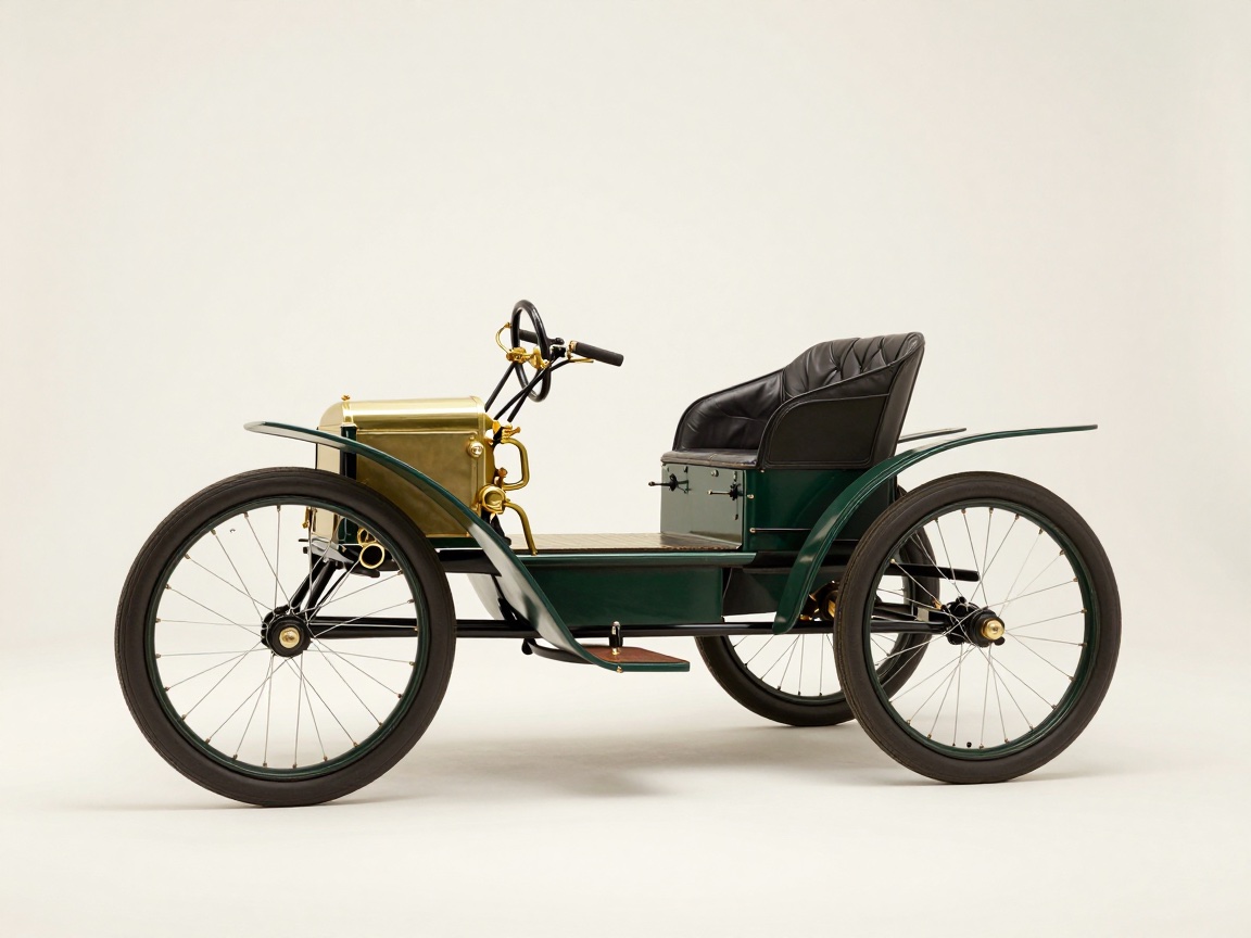 An antique motor car with a dark green body, large wire-spoke wheels, a brass compartment, and a black leather seat.