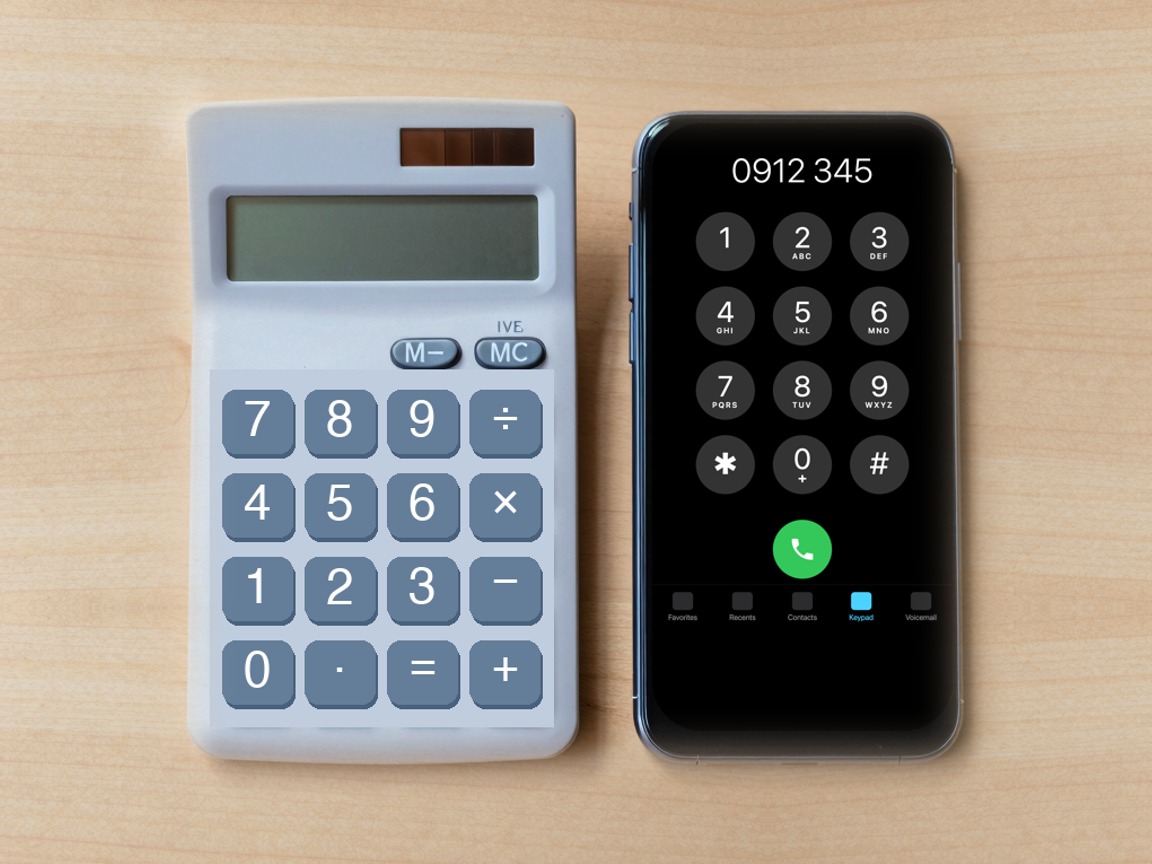 A calculator and a smartphone dial pad lie side by side, showing their reversed number keypad layouts.